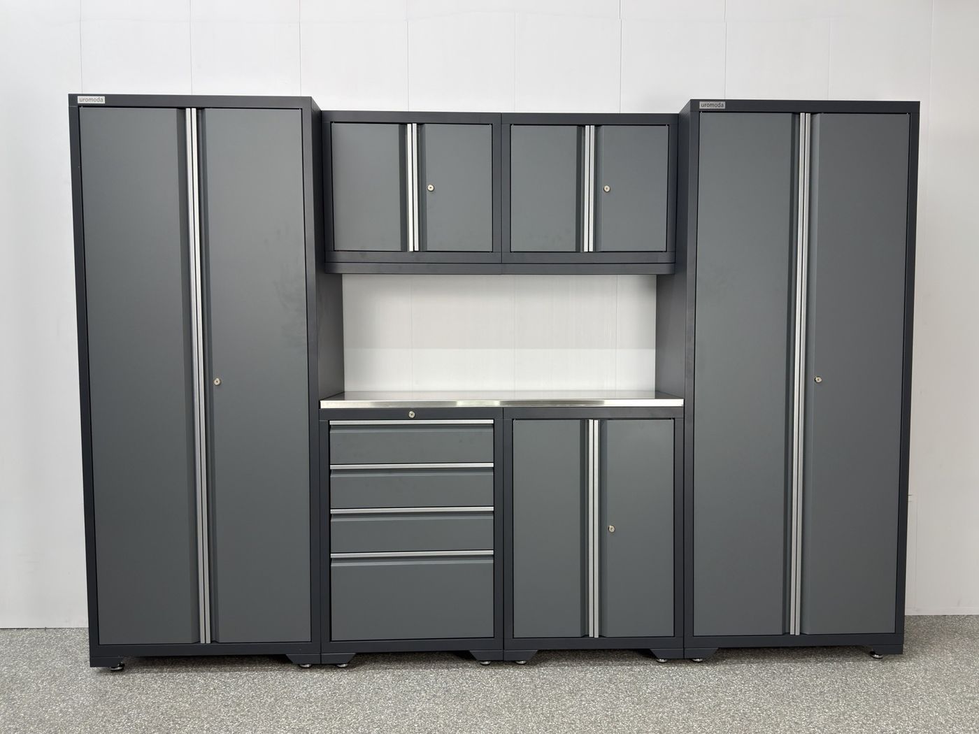 Uromoda _uno 7-Piece set: two tall cabinets, two wall cabinets over a 48-inch stainless steel work surface, a drawer base and a door base